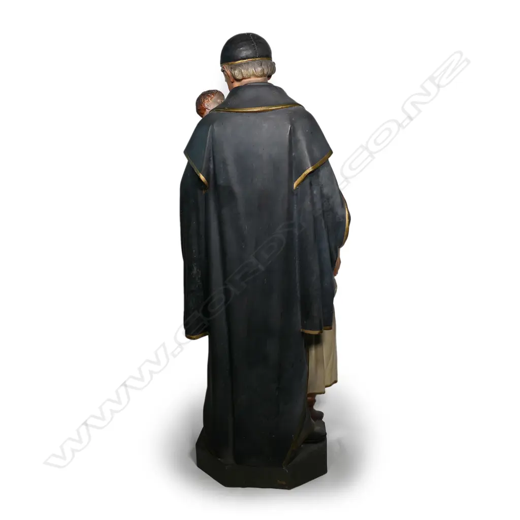 An early 20thC French terracotta religious figure group of St Vincent de Paul with two children Image 1++