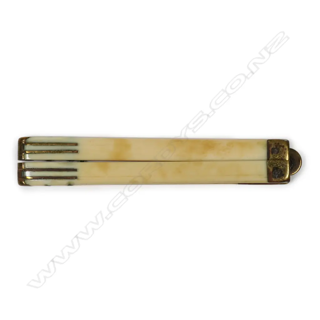 A 12-inch four-fold ivory and brass rule Image 1++