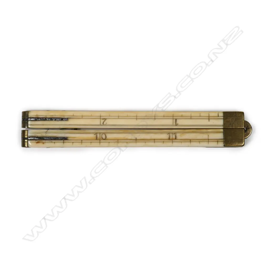 A 12-inch four-fold ivory and brass rule Image 1++