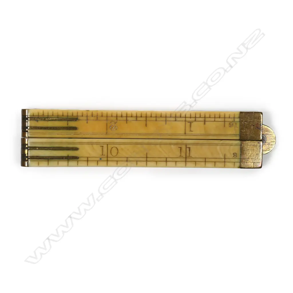 A 12-inch four-fold ivory and brass rule Image 1++