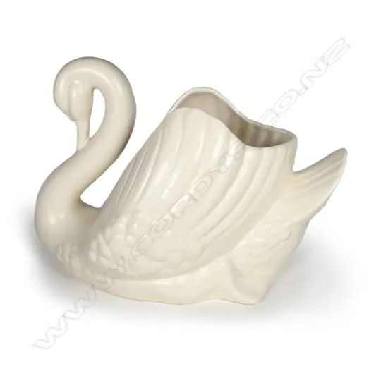 A large white Crown Lynn swan