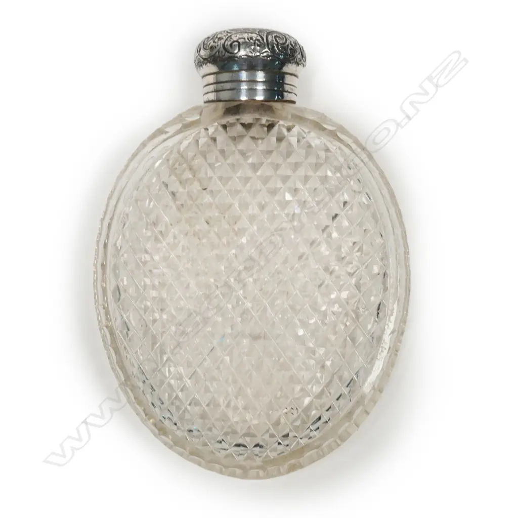 An early 1900s cut crystal perfume flask Image 1++