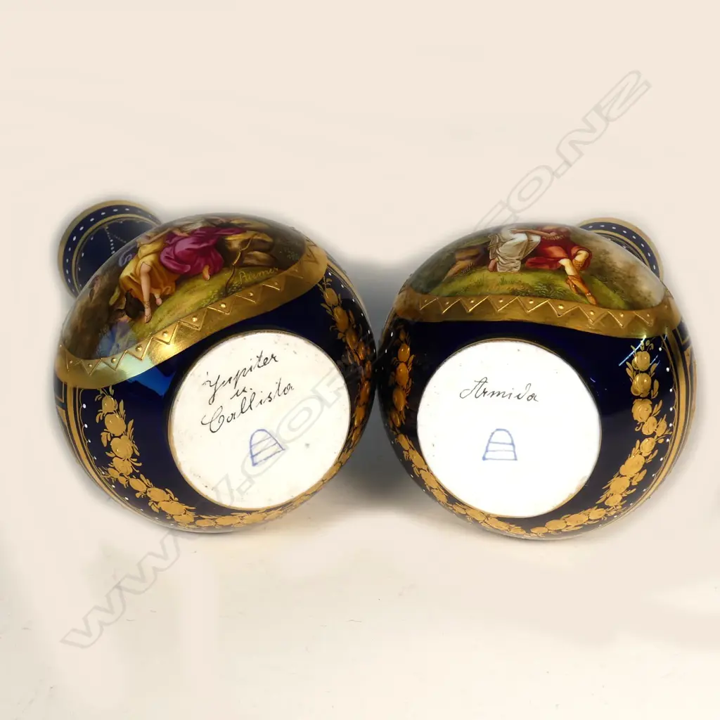 A pair of early 20thC Royal Vienna hand painted porcelain vases Image 1++