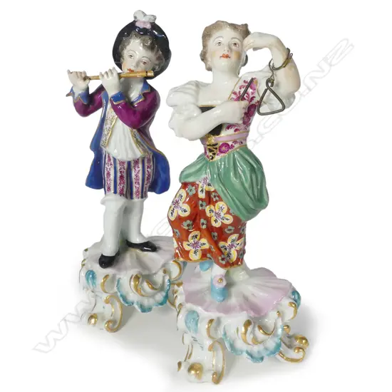 A pair of 19thC Chelsea type figurines