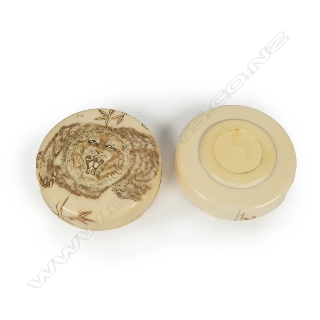 A Japanese Meiji carved ivory circular lidded trinket box Image 1++