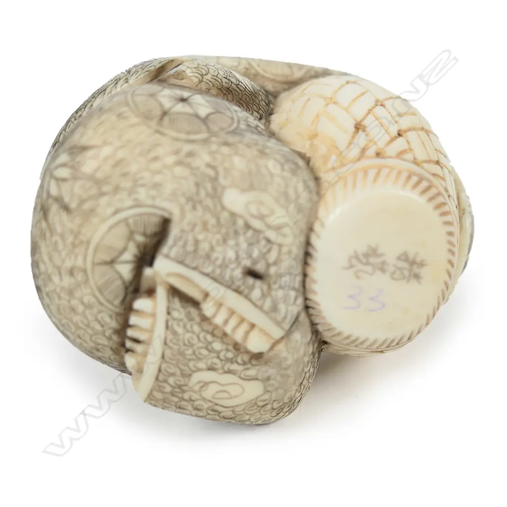 A Japanese carved ivory okimono Image 1++