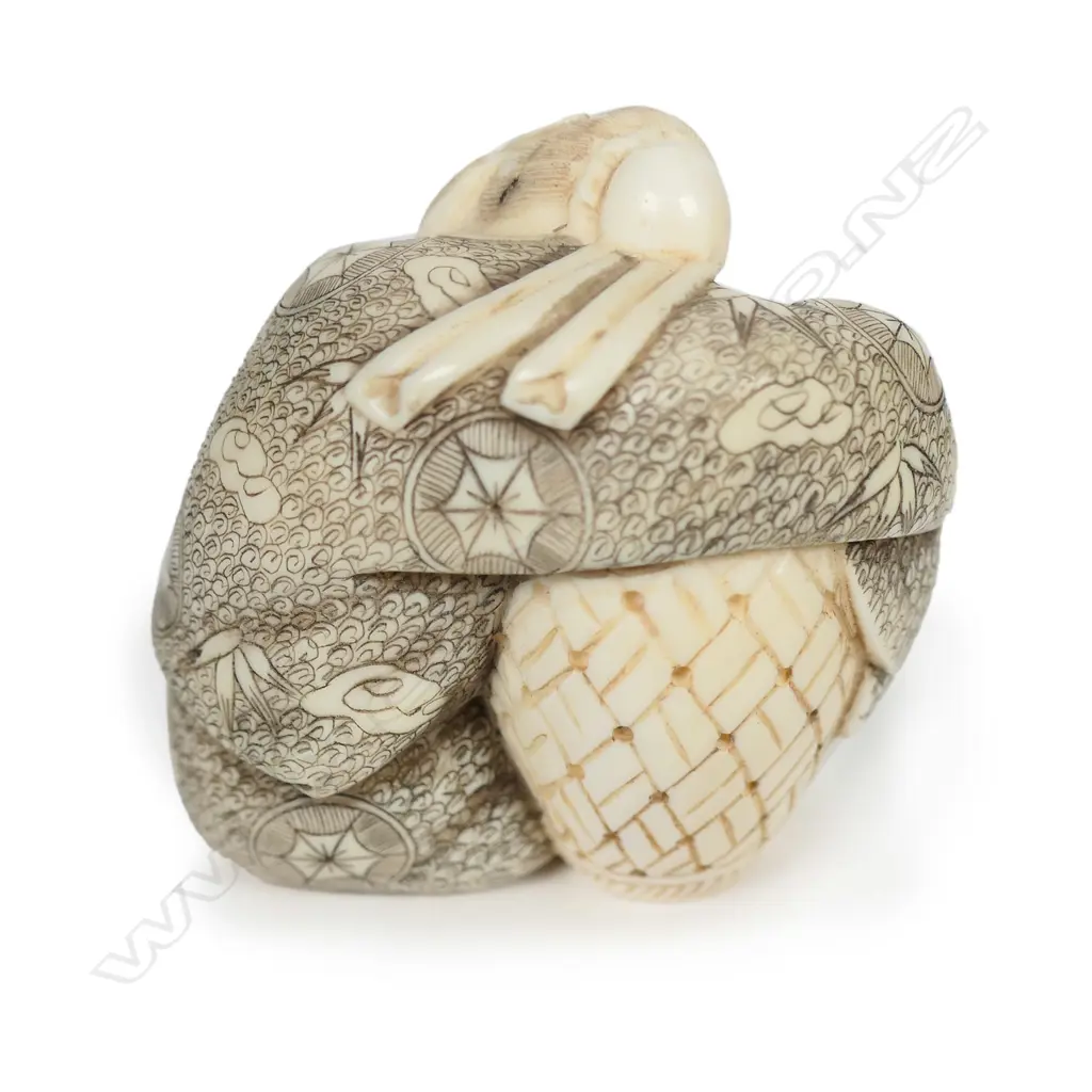 A Japanese carved ivory okimono Image 1++