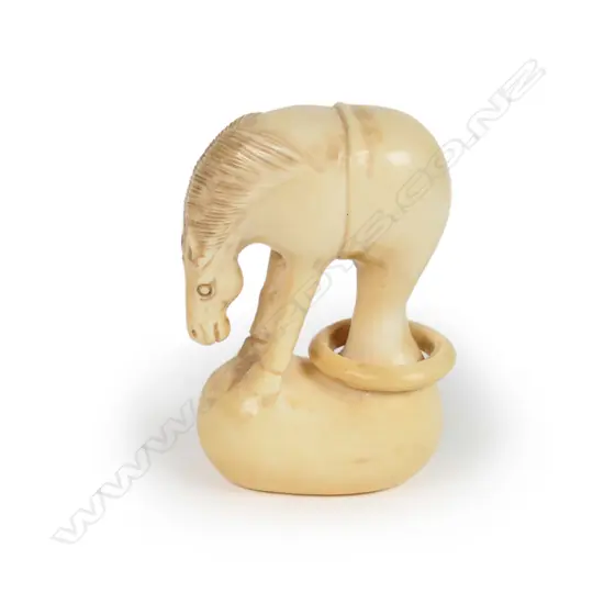 A Japanese carved ivory netsuke