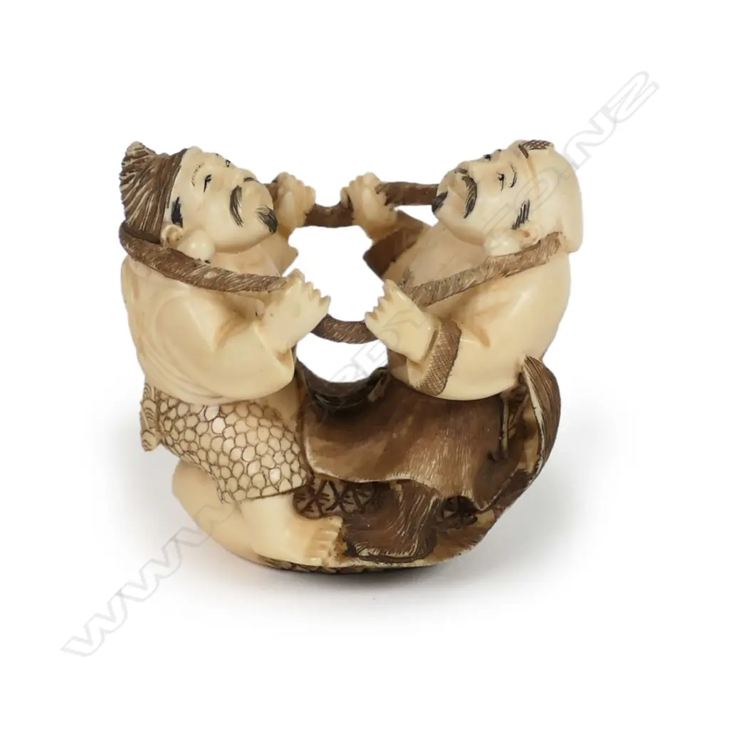 A Japanese carved ivory netsuke Image 1++