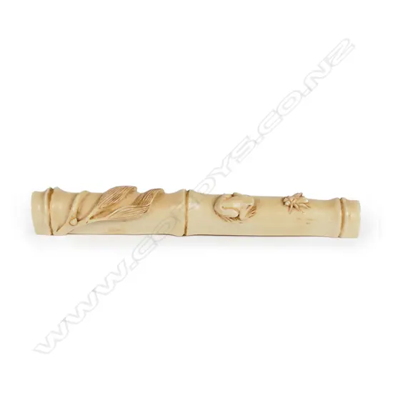 A Japanese carved ivory paperweight