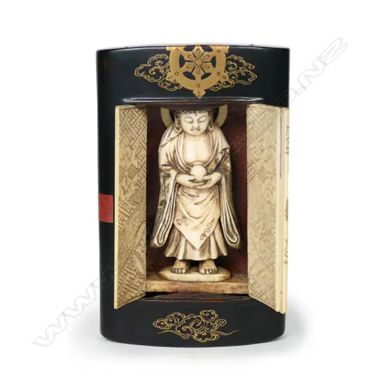 A 19thC Japanese black lacquered and carved ivory pocket shrine