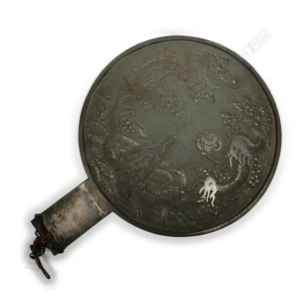 A large Chinese bronze mirror Image 1++