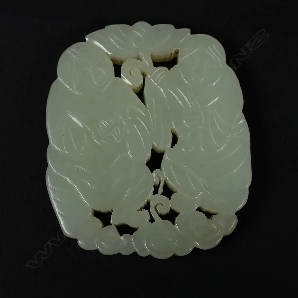 A c.1900 Chinese pale green jade carved pendant Image 1++
