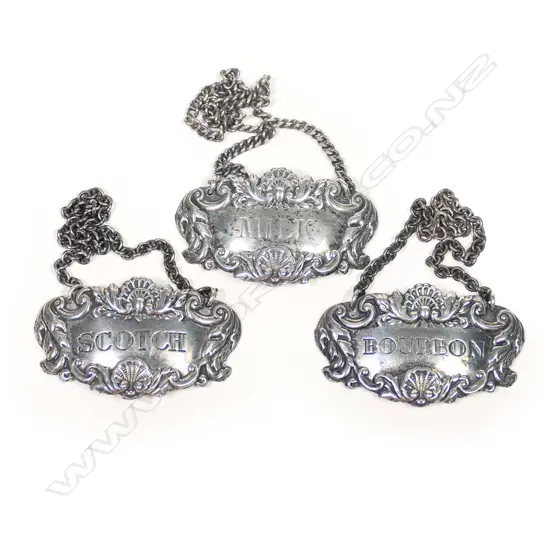 Three silver decanter tickets