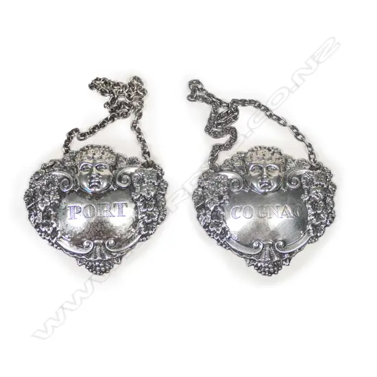 Two silver decanter tickets