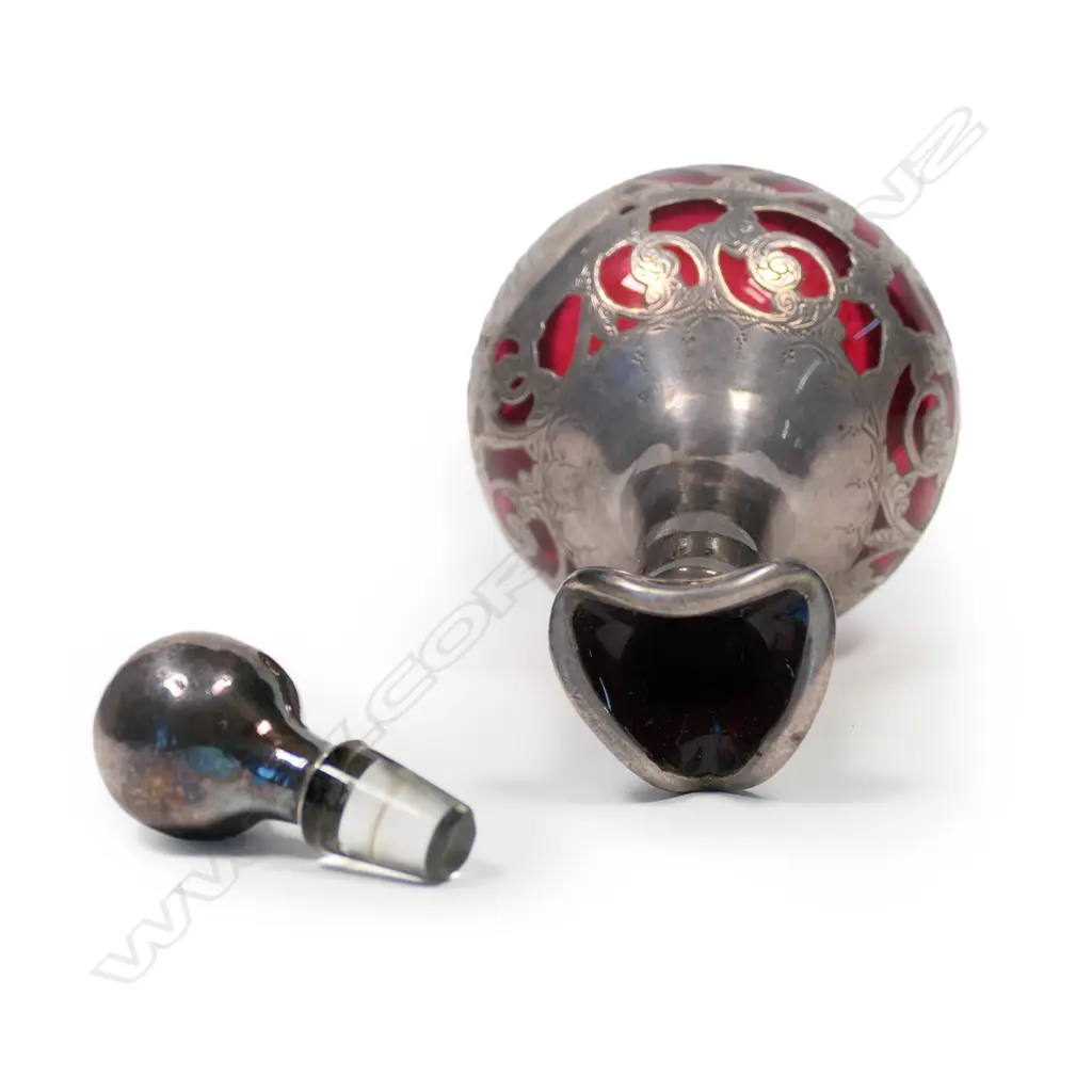 A late Victorian silver over ruby glass scent bottle Image 1++