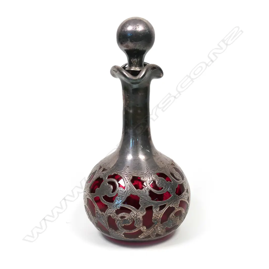 A late Victorian silver over ruby glass scent bottle Image 1++