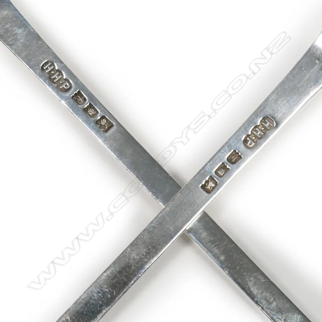 A pair of silver salad servers Image 1++