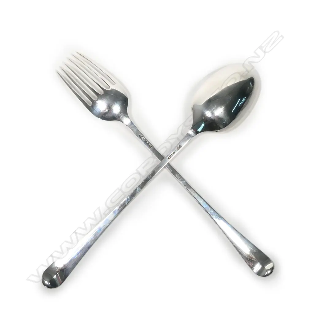 A pair of silver salad servers Image 1++