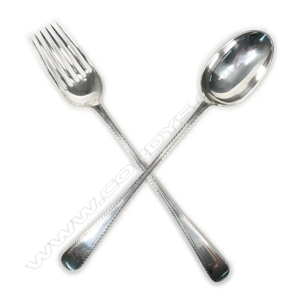 A pair of silver salad servers Image 1++