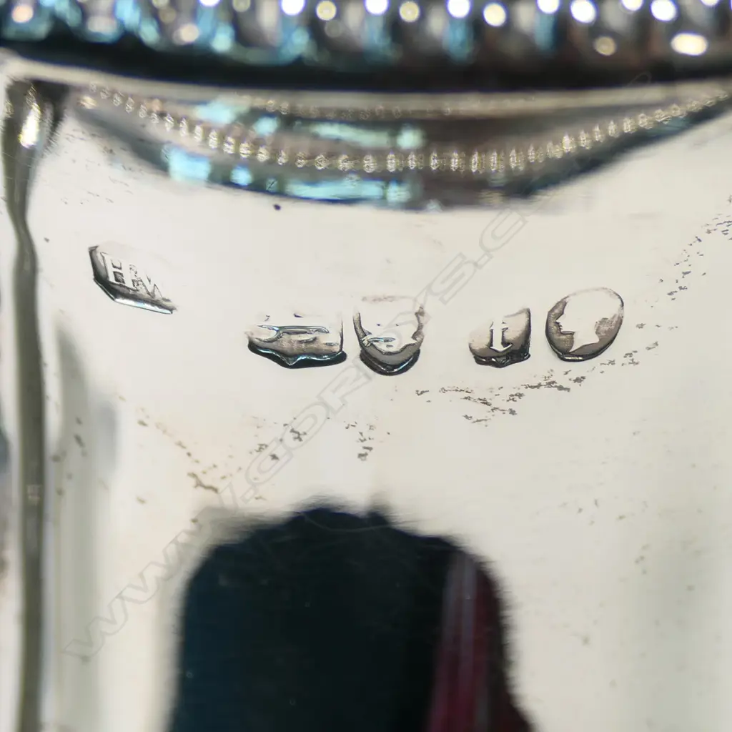 A Victorian silver four-piece tea and coffee service Image 1++