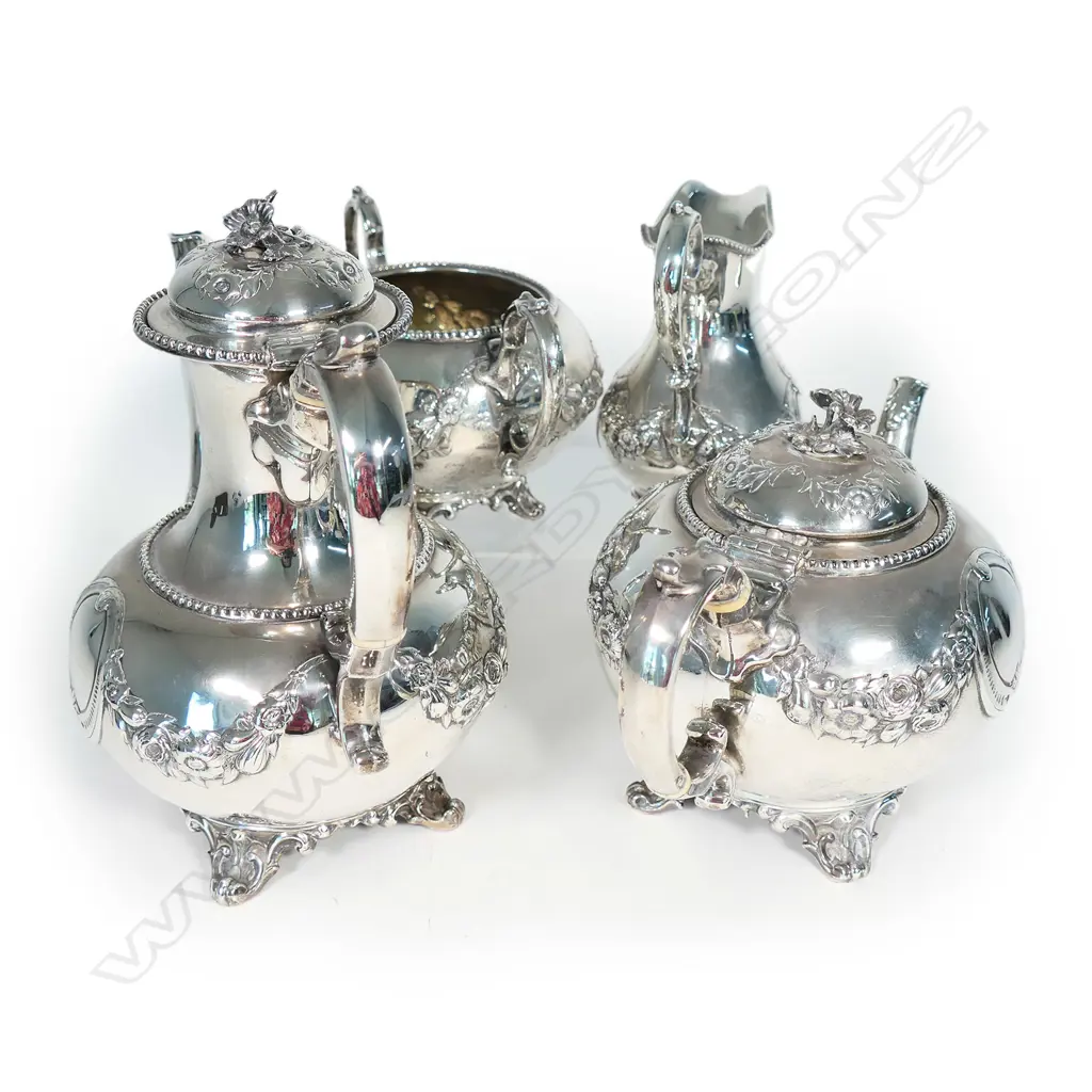 A Victorian silver four-piece tea and coffee service Image 1++