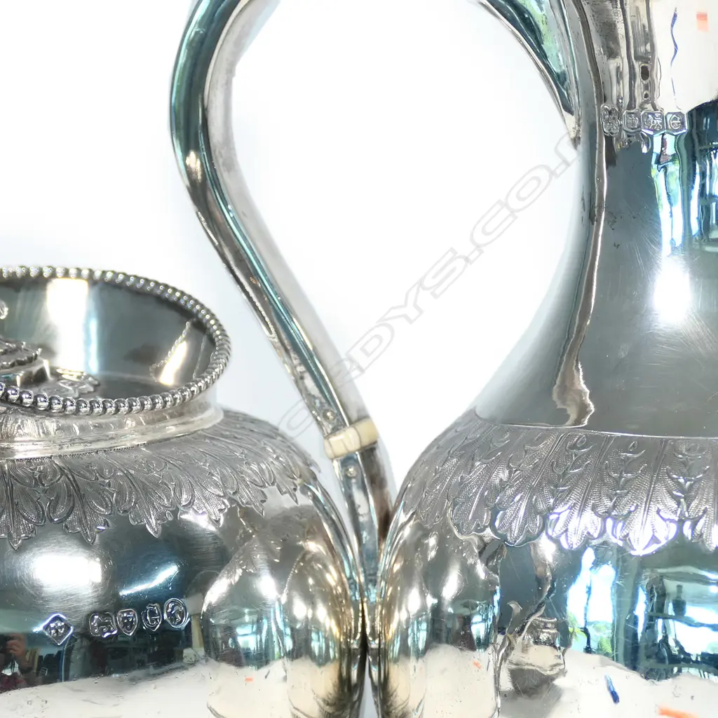 A Victorian silver four-piece tea service Image 1++