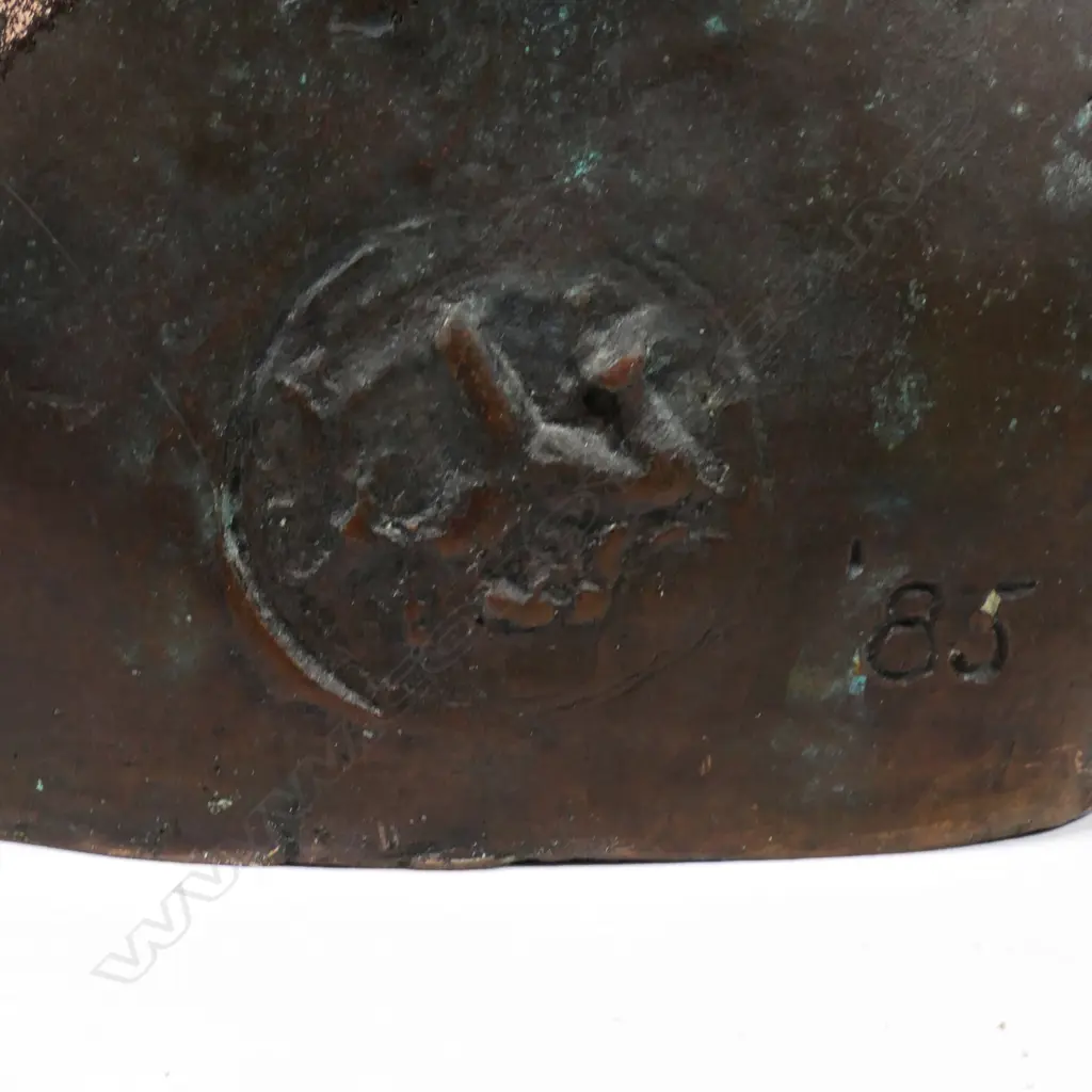 A bronze bust of a woman Image 1++