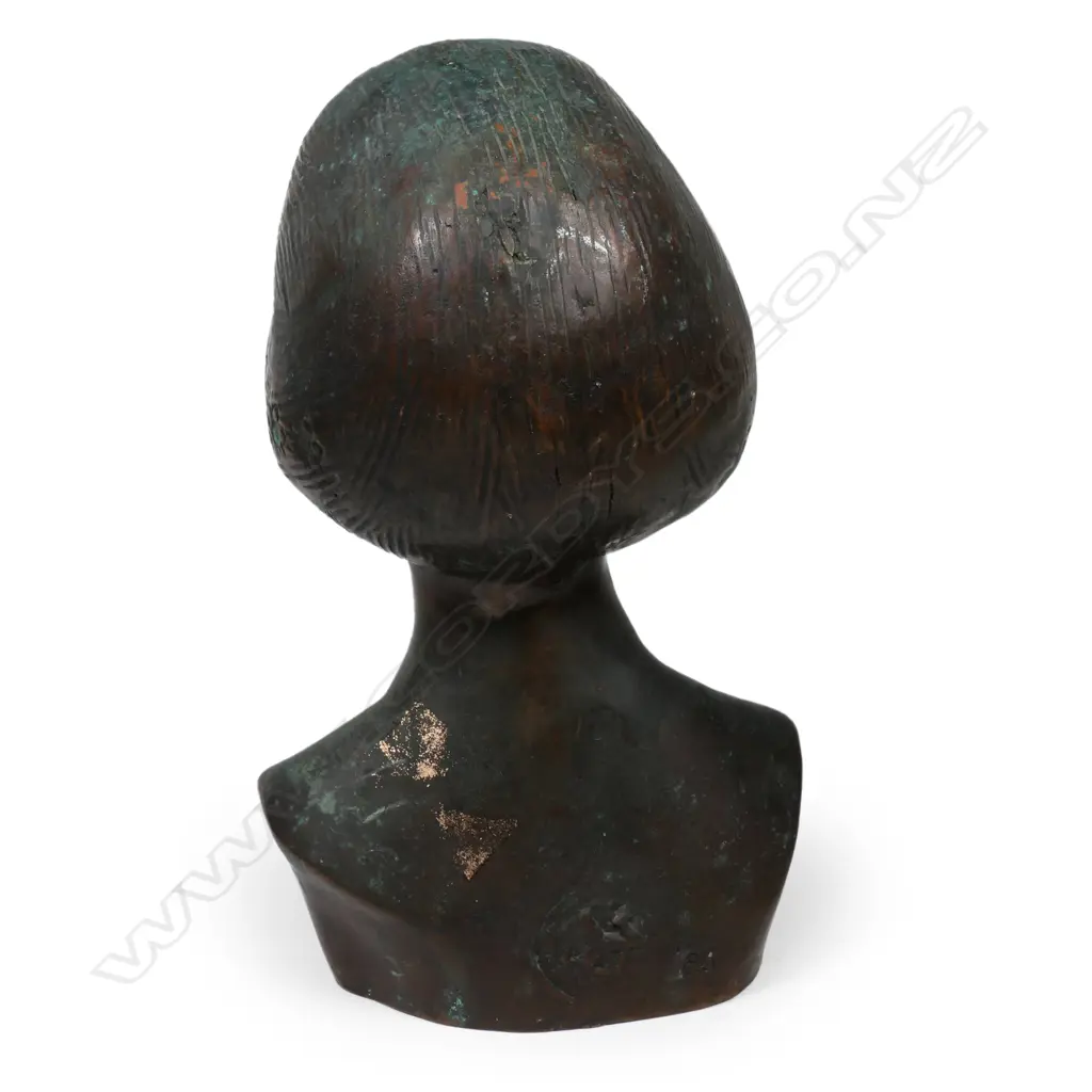 A bronze bust of a woman Image 1++
