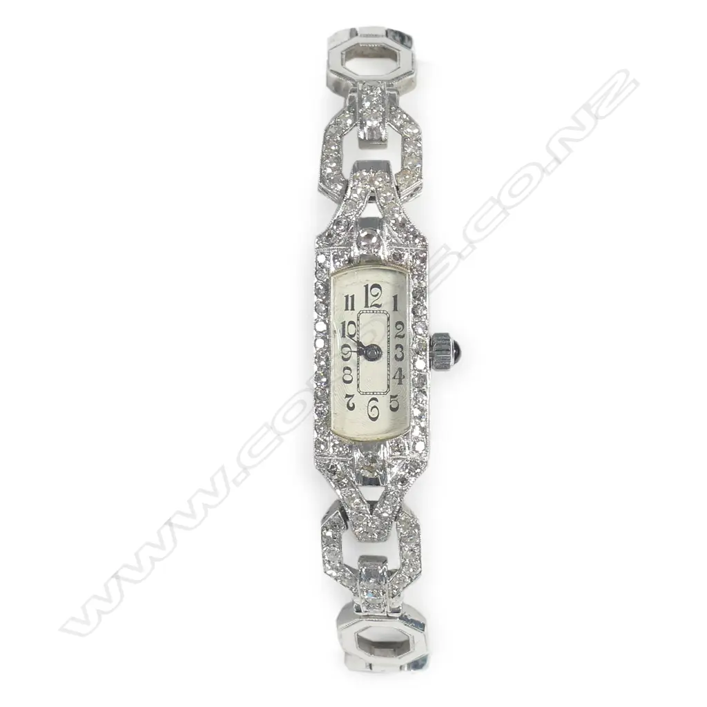 A lady’s platinum and diamond cocktail watch Image 1++