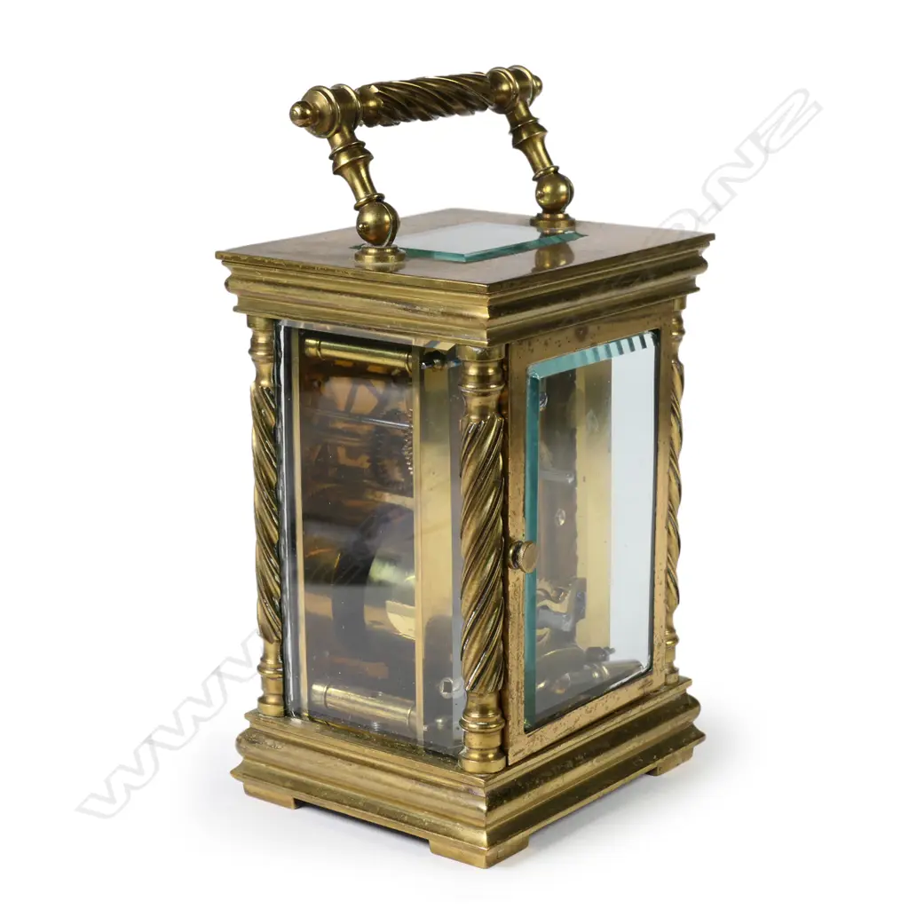 A brass cased carriage clock Image 1++