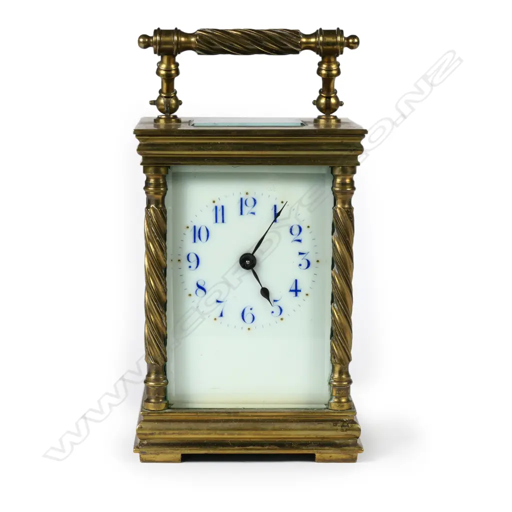 A brass cased carriage clock Image 1++