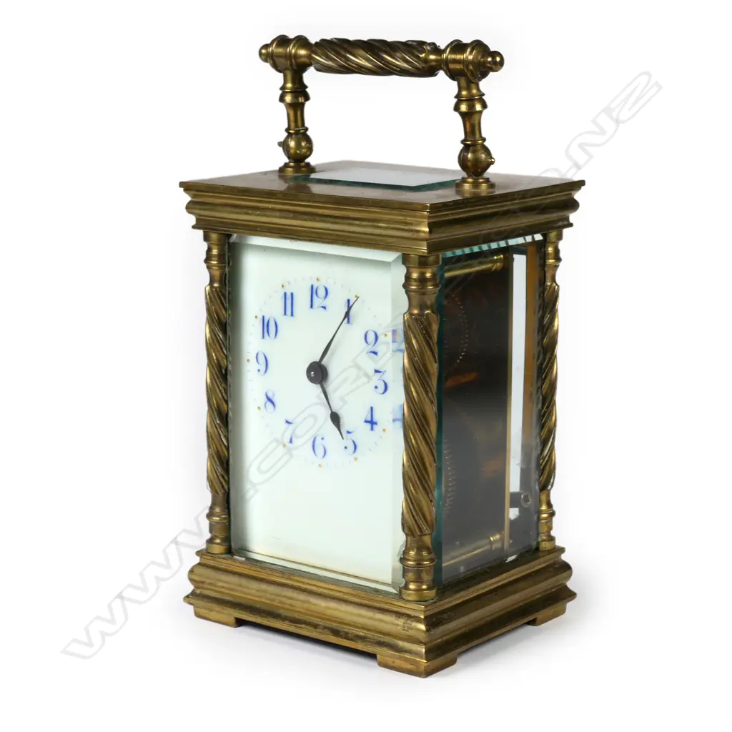 A brass cased carriage clock Image 1++