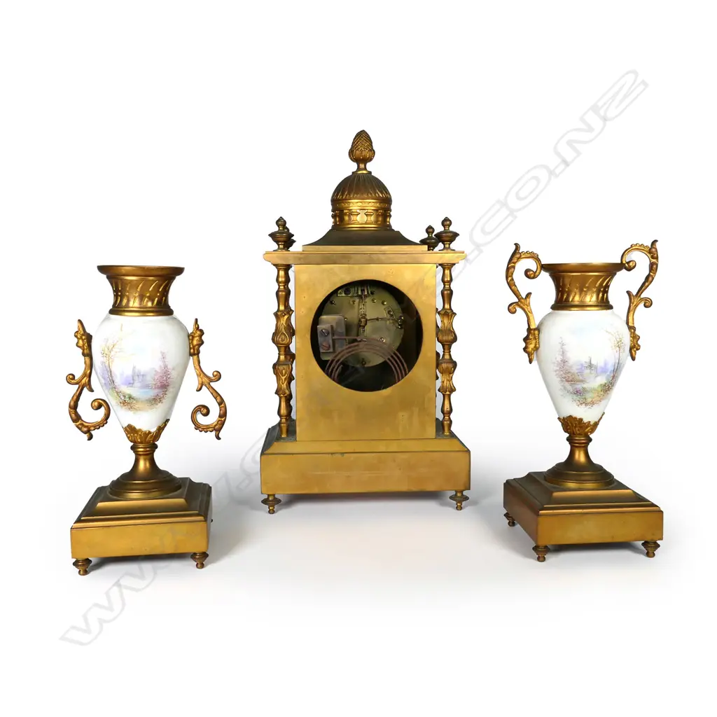 A 19thC French brass and porcelain clock and garniture Image 1++