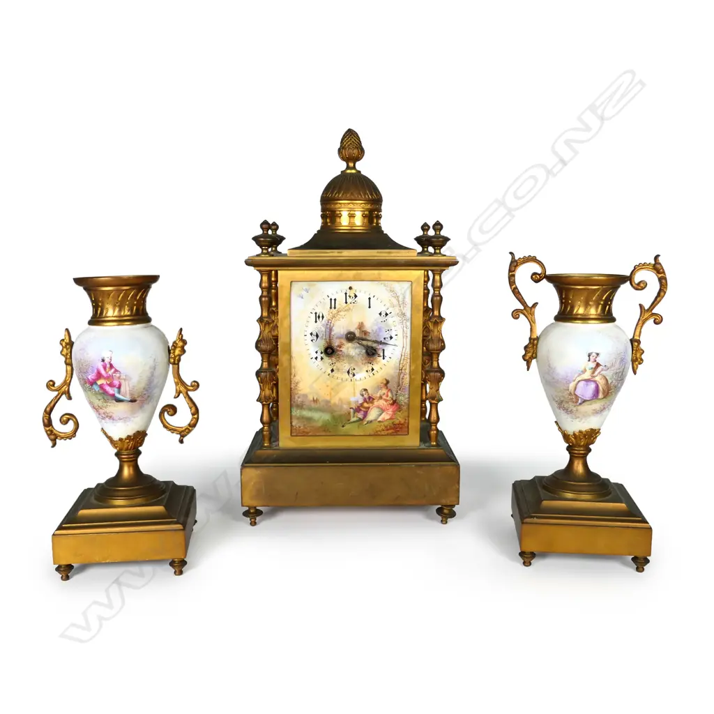 A 19thC French brass and porcelain clock and garniture Image 1++