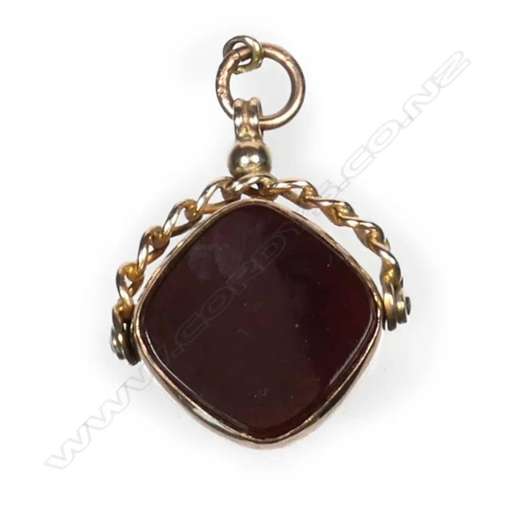 An early 20thC 9ct gold and hardstone fob spinner Image 1++