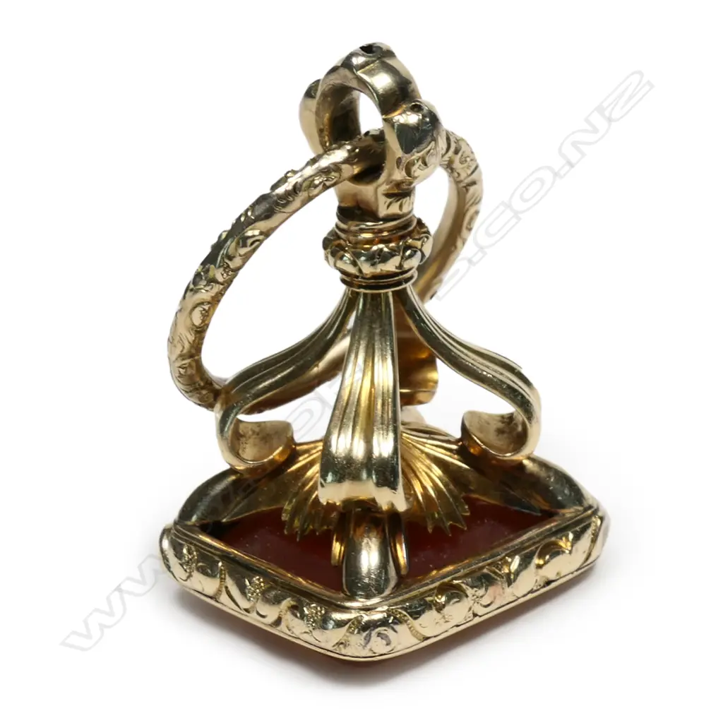 An 19thC 18ct gold plated and red carnelian fob seal Image 1++