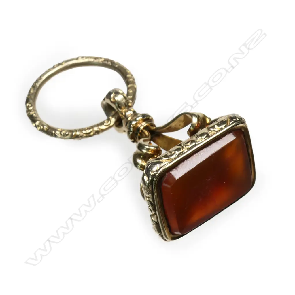 An 19thC 18ct gold plated and red carnelian fob seal Image 1++