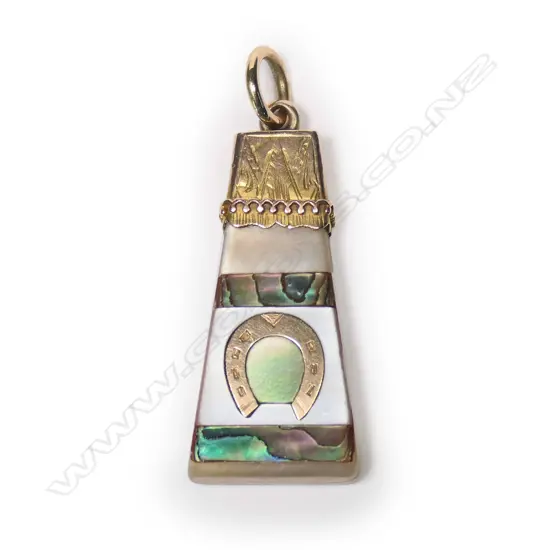 A late 19thC colonial gold and paua mounted mother-of-pearl pendant