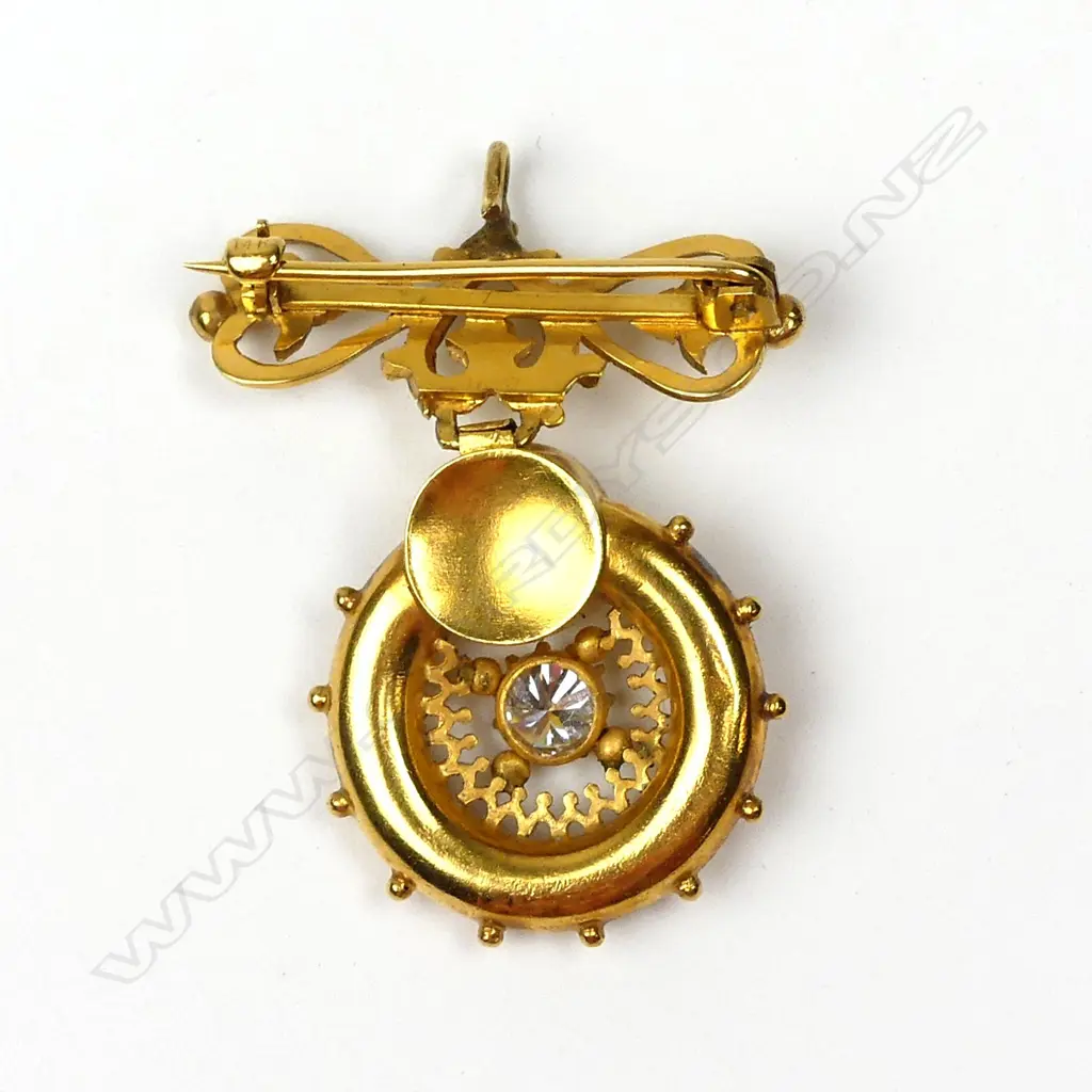 An antique 14ct. yellow gold and diamond suspended pendant brooch Image 1++