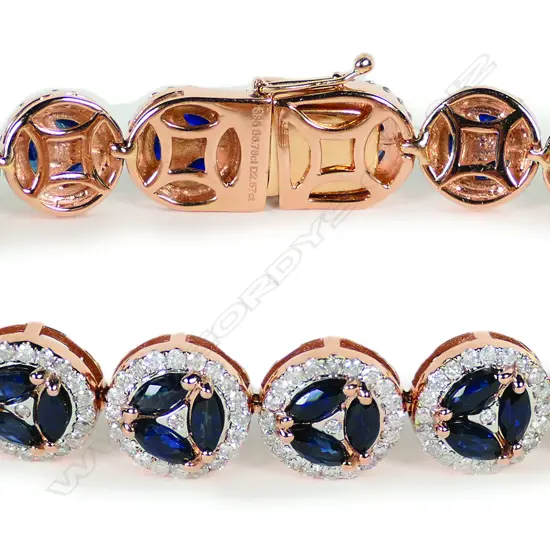 A 14ct rose gold sapphire and diamond halo bracelet