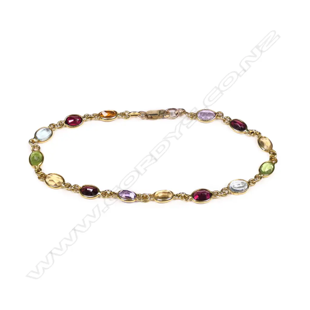 An 18ct and multi gemstone set bracelet Image 1++
