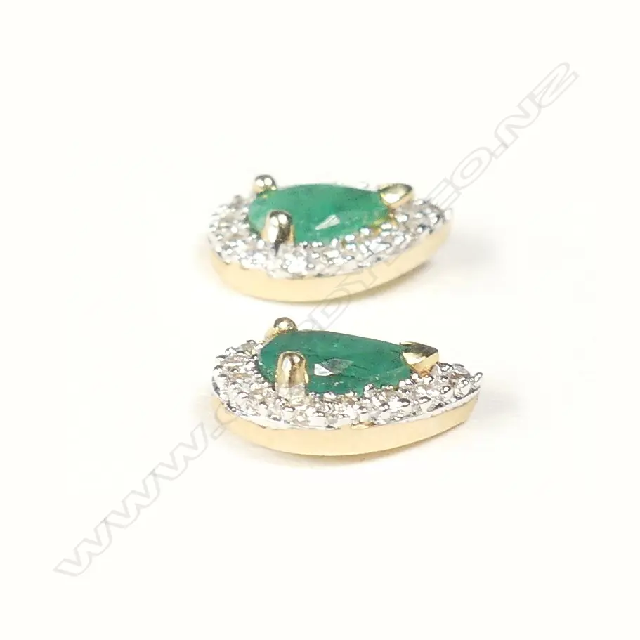 A pair of modern 9ct. yellow gold emerald and diamond earrings Image 1++