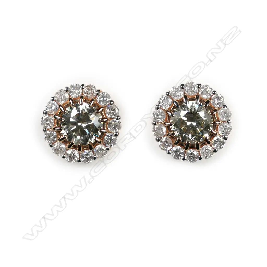 A pair of 14ct rose gold and diamond halo earrings Image 1++