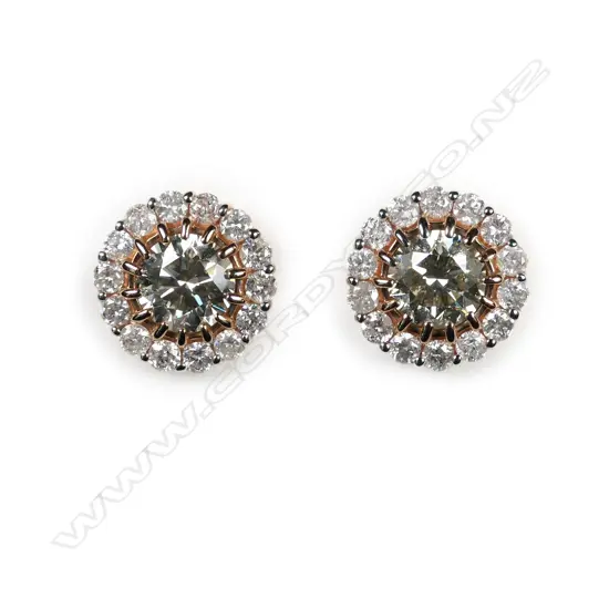 A pair of 14ct rose gold and diamond halo earrings
