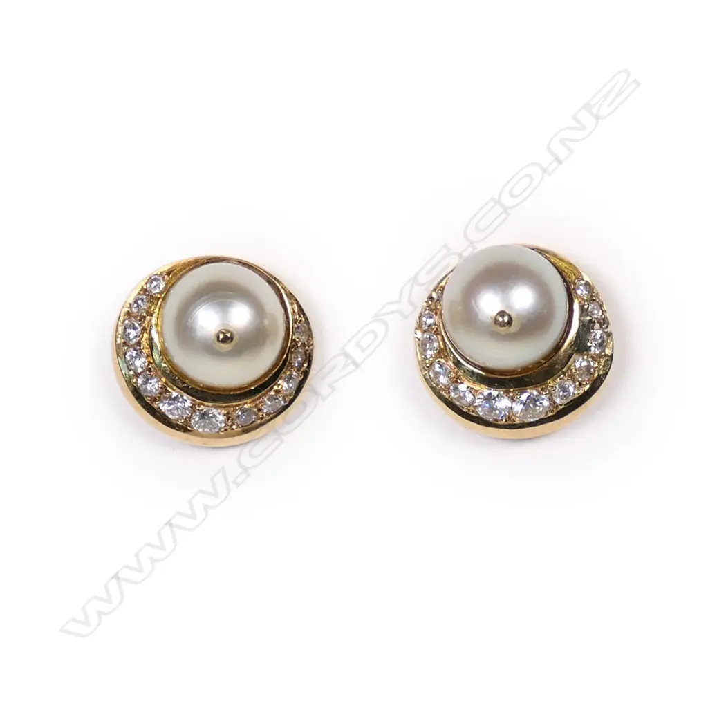 A pair of 18ct gold diamond and pearl earrings Image 1++
