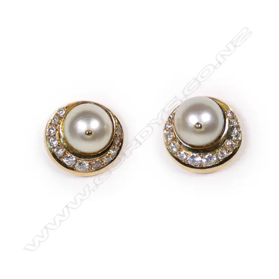 A pair of 18ct gold diamond and pearl earrings