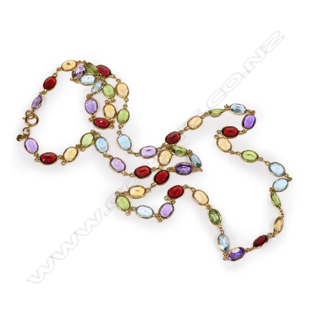 An 18ct and multi gemstone set necklace Image 1++