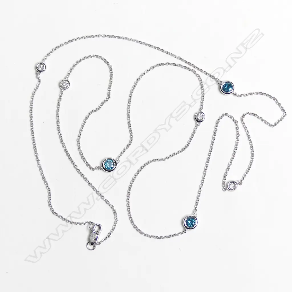 A 14ct white gold and diamond necklace Image 1++