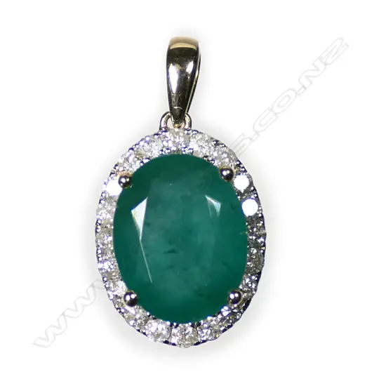 A 14ct yellow and white gold emerald and diamond halo pendant